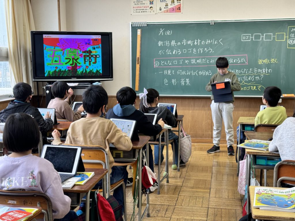 新潟県新潟市立大野小学校での授業風景。iPadを使って新潟の市町村のロゴを作る、社会の授業。